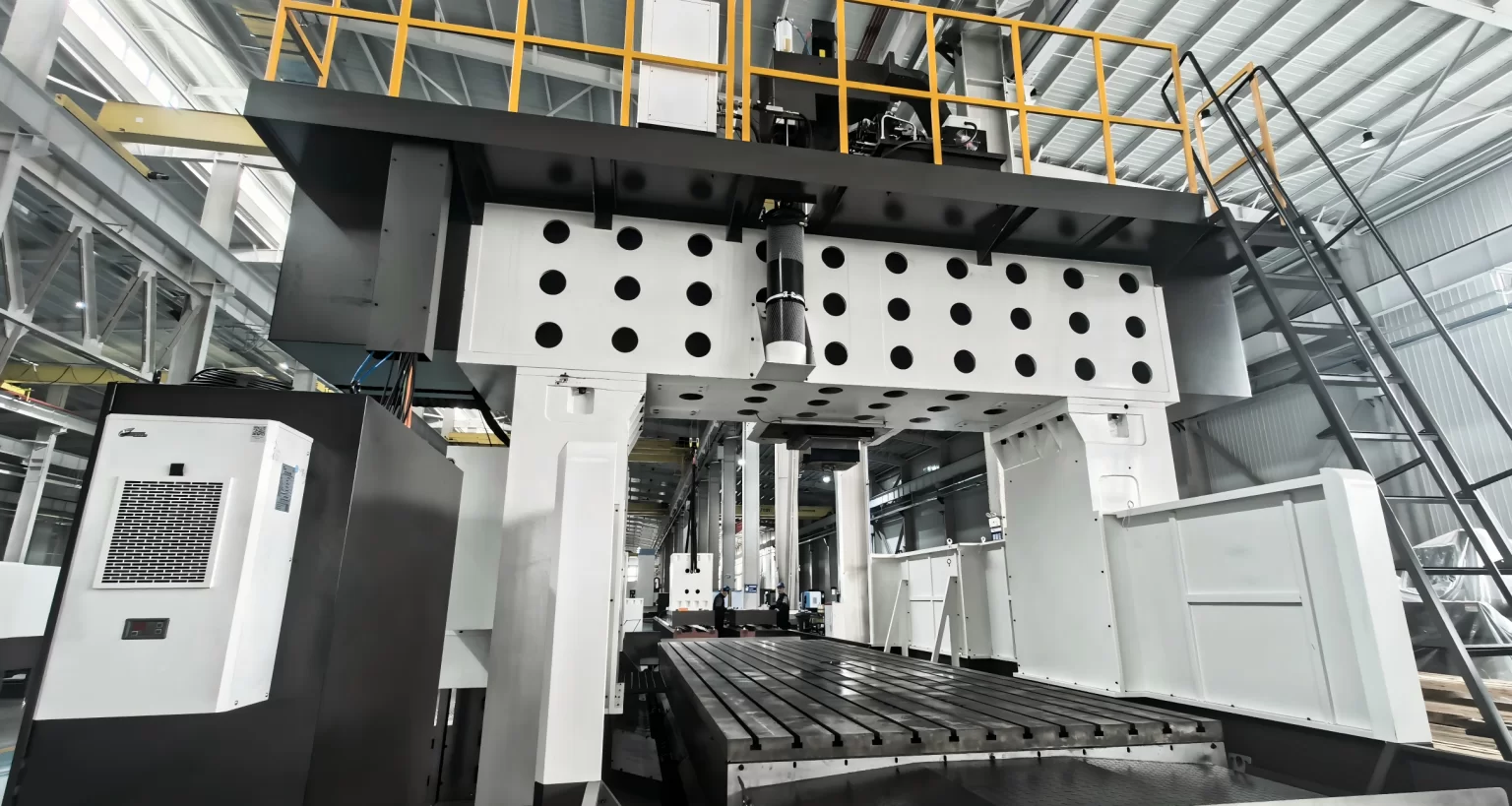 Internal structure of a gantry machining center showing the columns, cross rail and spindle carriage arrangement